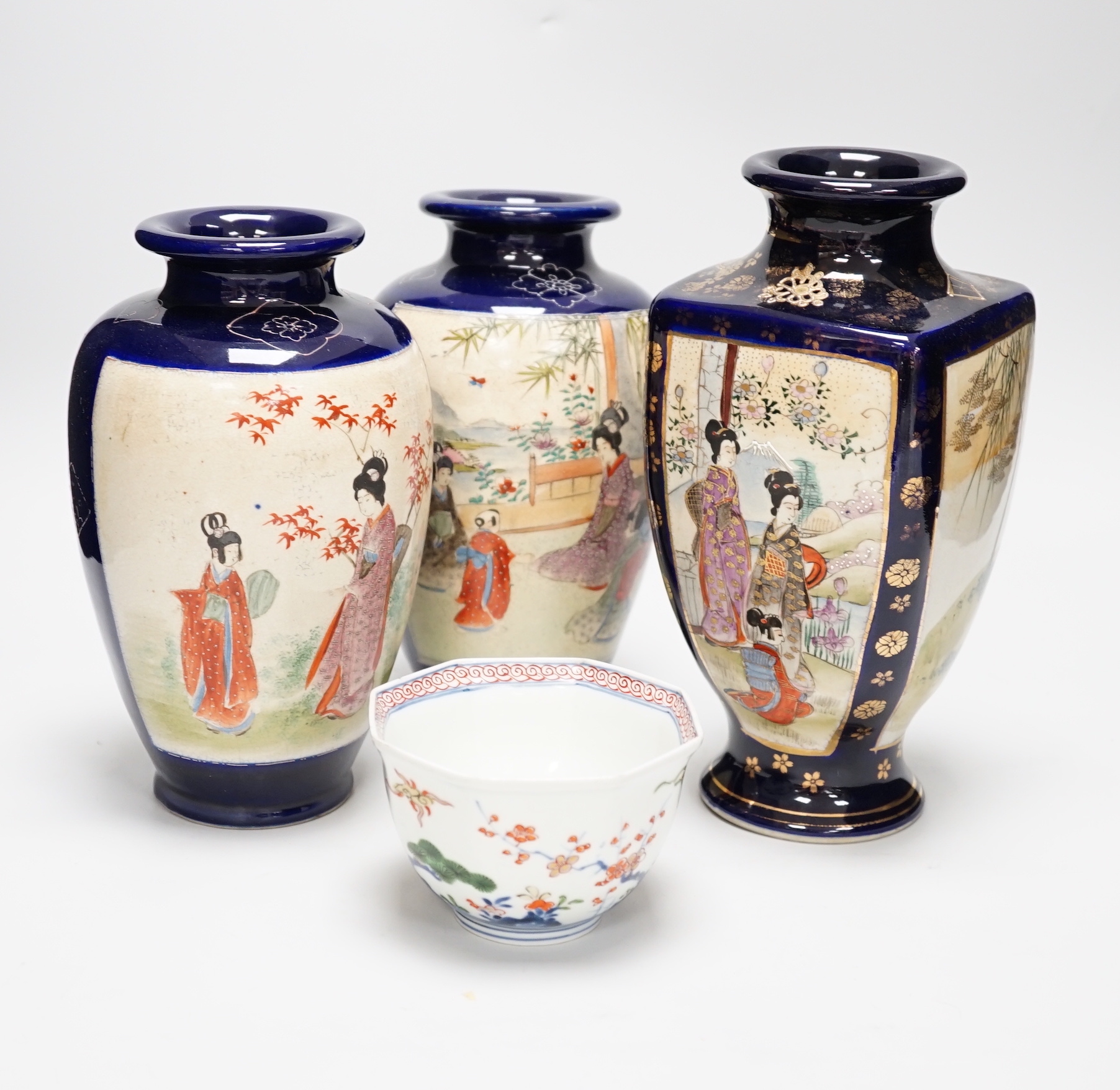 A Japanese Kakiemon bowl and three Satsuma pottery vases, tallest 24cm
